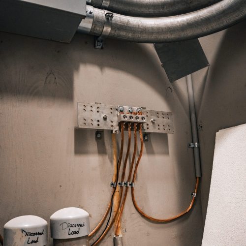 Commercial wiring junction box with multiple circuit connections in mechanical room